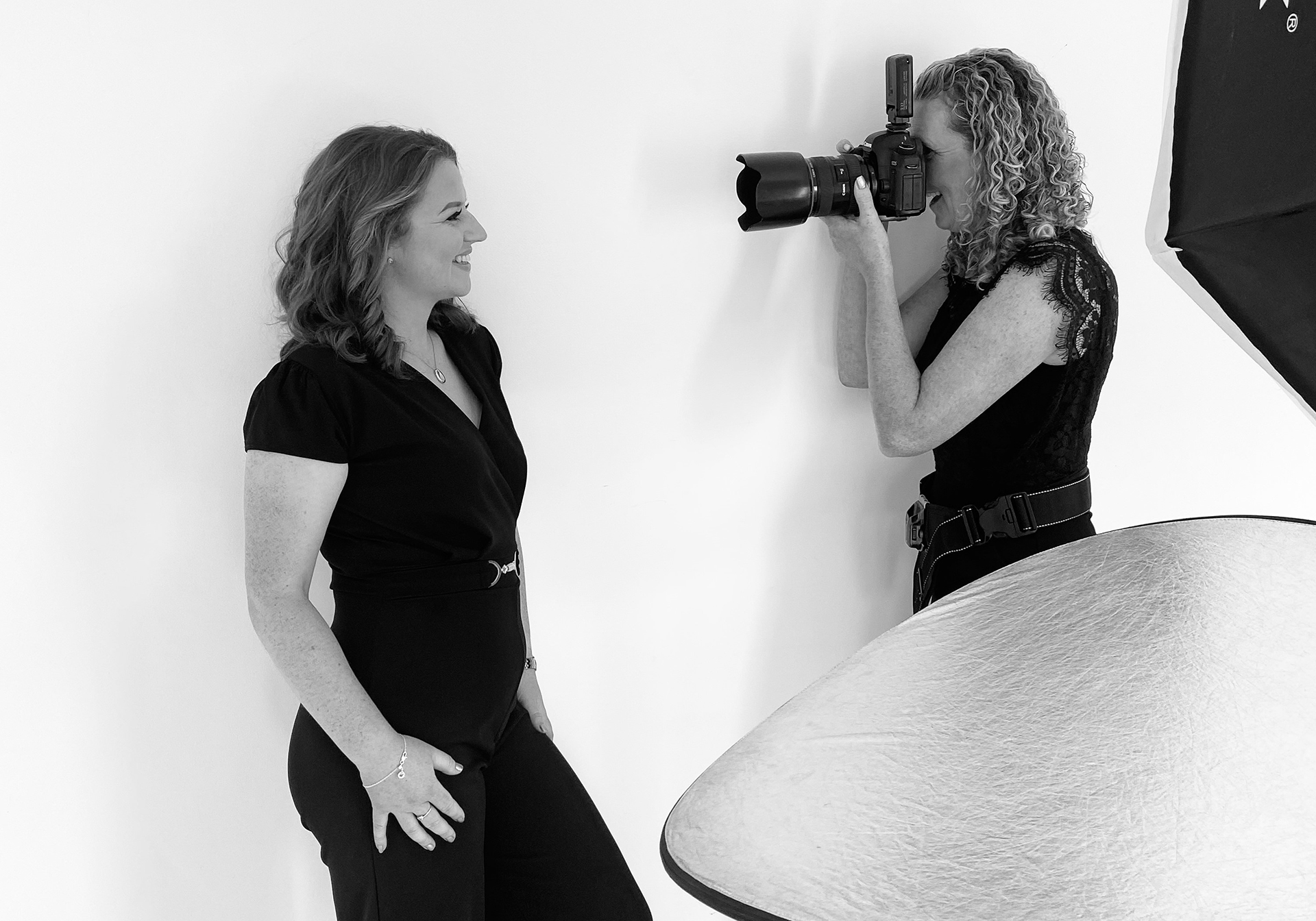 Jill O'Meara photographing a client in her Enfield studio