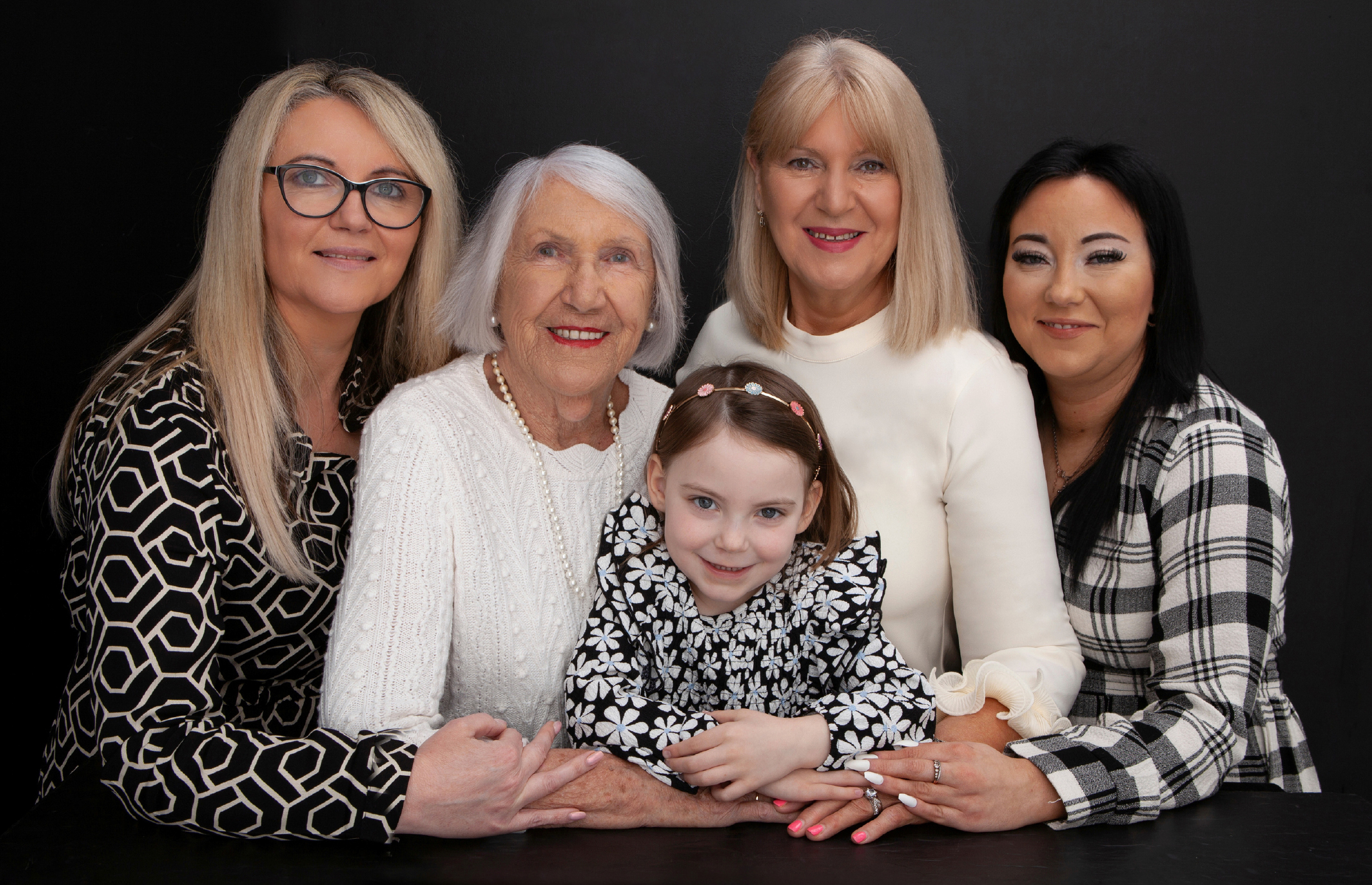 Five generations of ladies, studio portrait by Jill O'Meara